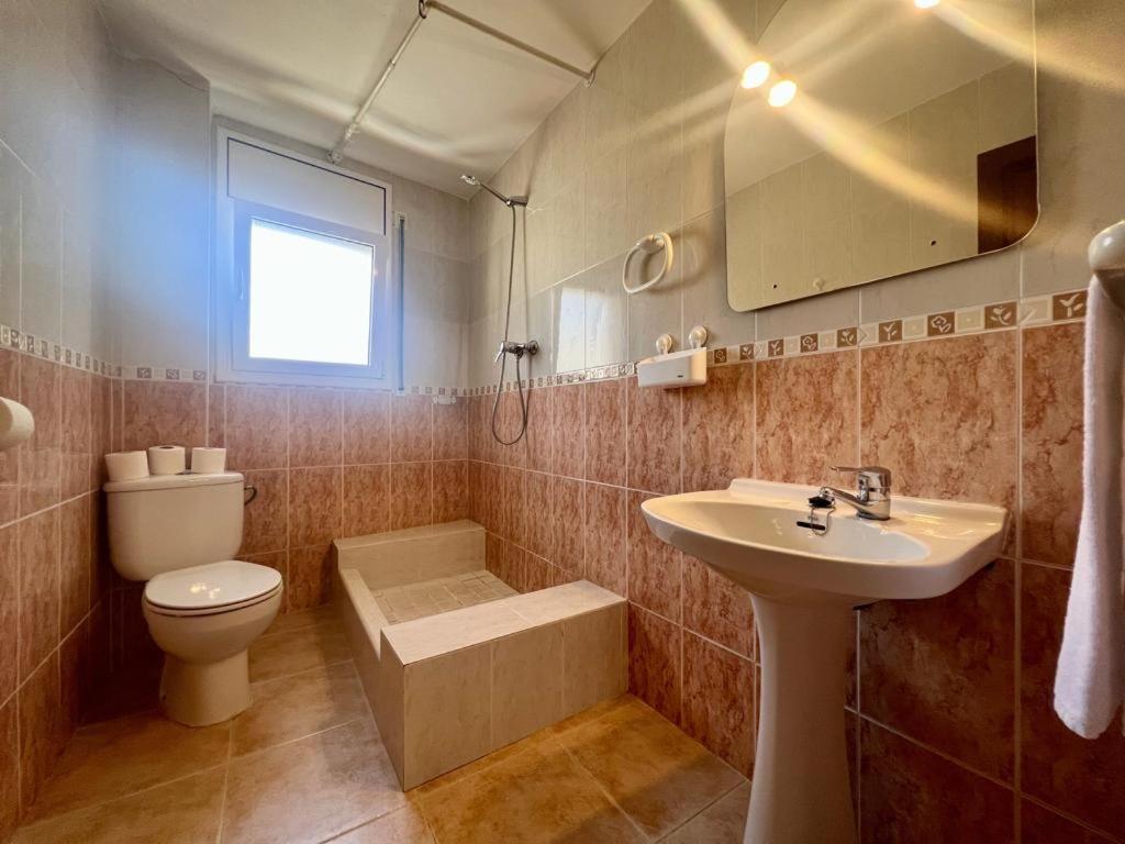 Apartamentos Ancora Romana Калафел Екстериор снимка